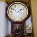 JUSTIME Traditional Schoolhouse Arabic Pendulum Wall Clock Chimes Hourly with Westminster Melody Made in Taiwan, 4AA Batteries Included (PP0258-ADW Dark Wood Grain)